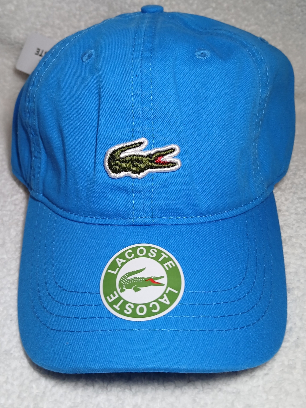 Lacoste Men's Blue Sport X Novak Djokovic Cap. Signature Crocodile.